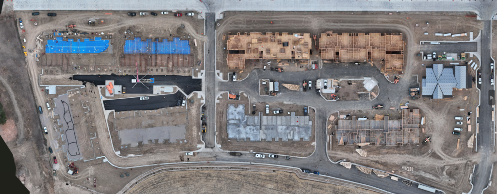 High-resolution drone aerial documenting construction progress across a multi-family residential development in Arvada, Colorado
