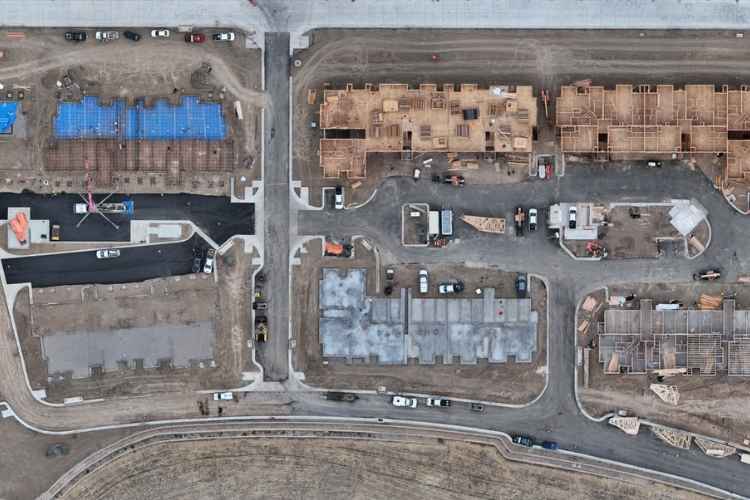 High-resolution drone aerial documenting construction progress across a multi-family residential development in Arvada, Colorado